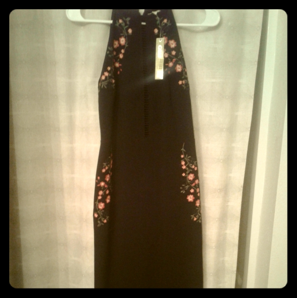 Cute black dress with embroidered flowers
